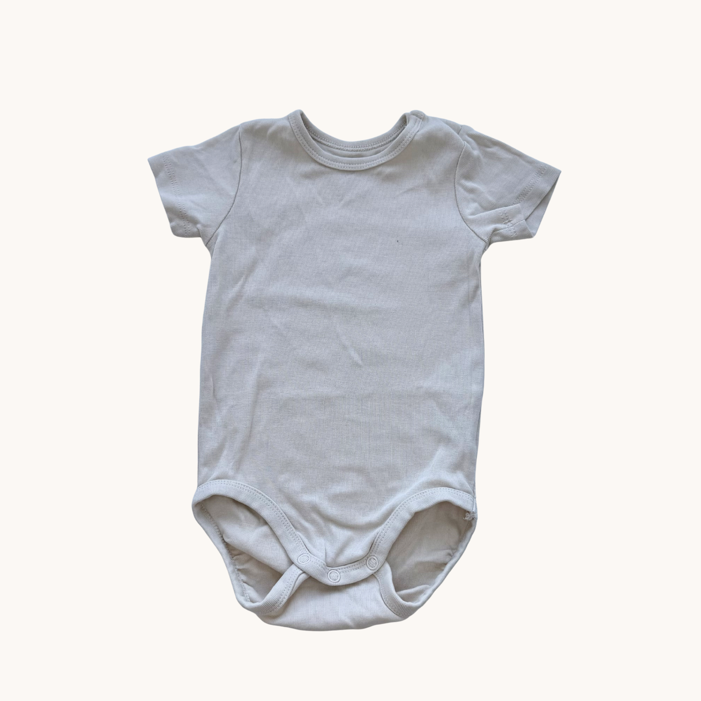 Secondhand Büdel | 9-12 Monate "Beige Hoppel"